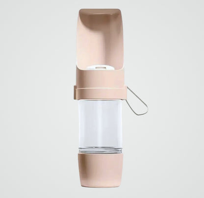 Portable beige pet water bottle with attached drinking tray and clear water container
